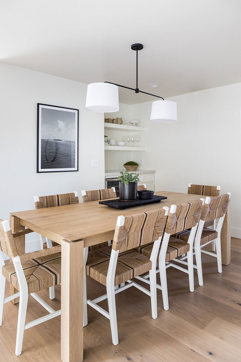 Dining space featuring warm woods and light, natural finishes, located in Newport Beach
