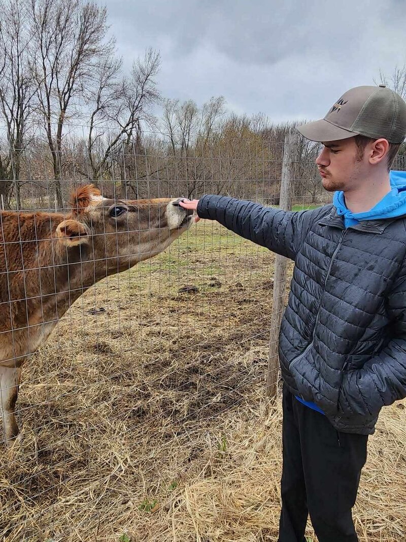 Owner Chasity cares for a donkey