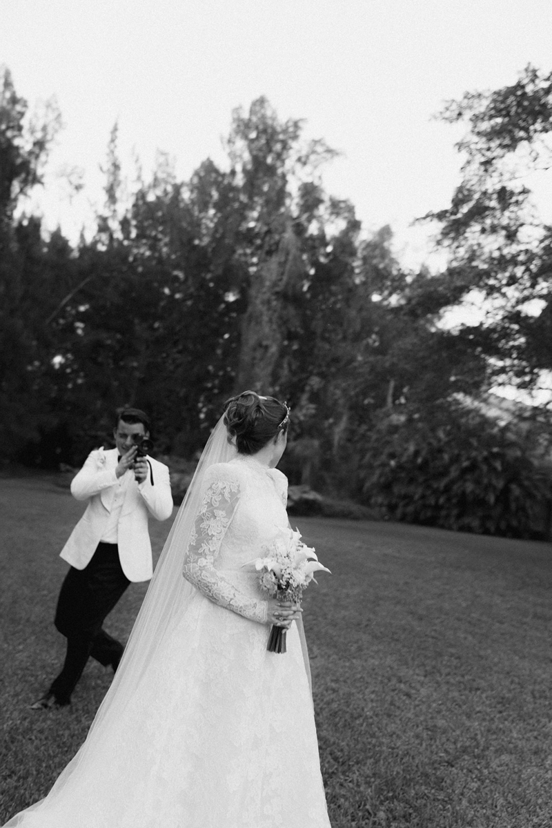 Super 8 wedding videography by the groom capturing the bride in her modest vintage lace wedding gown | Sush Digital Media