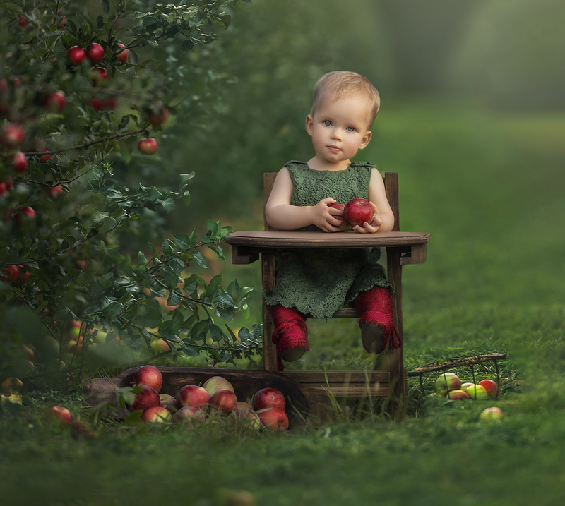 "1-year-old baby captured in a beautiful milestone photography session, celebrating their first year of life with adorable portraits in Ottawa."