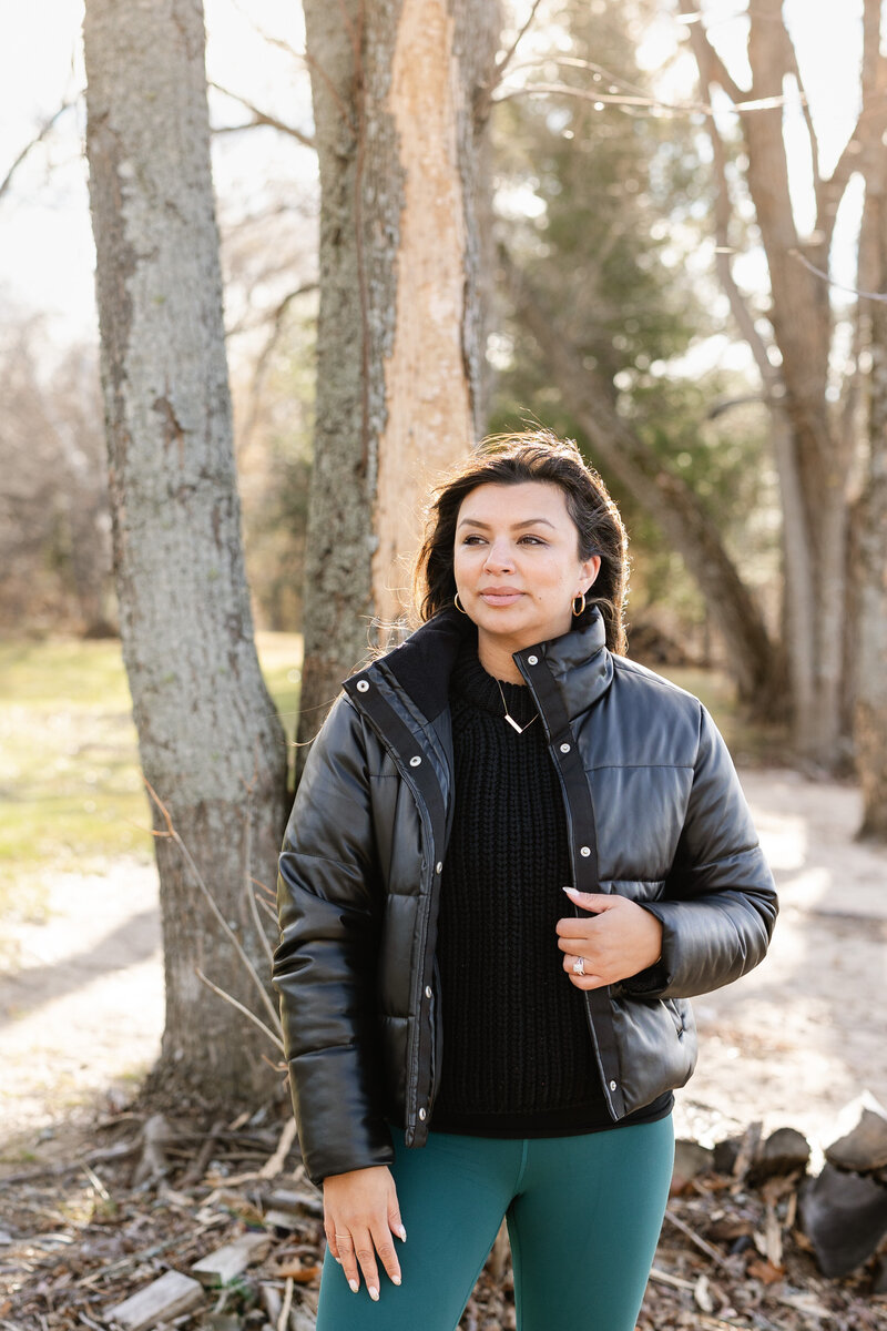 Meenakshi in a puffer jacket at the Ottawa River Beach House for a vacation