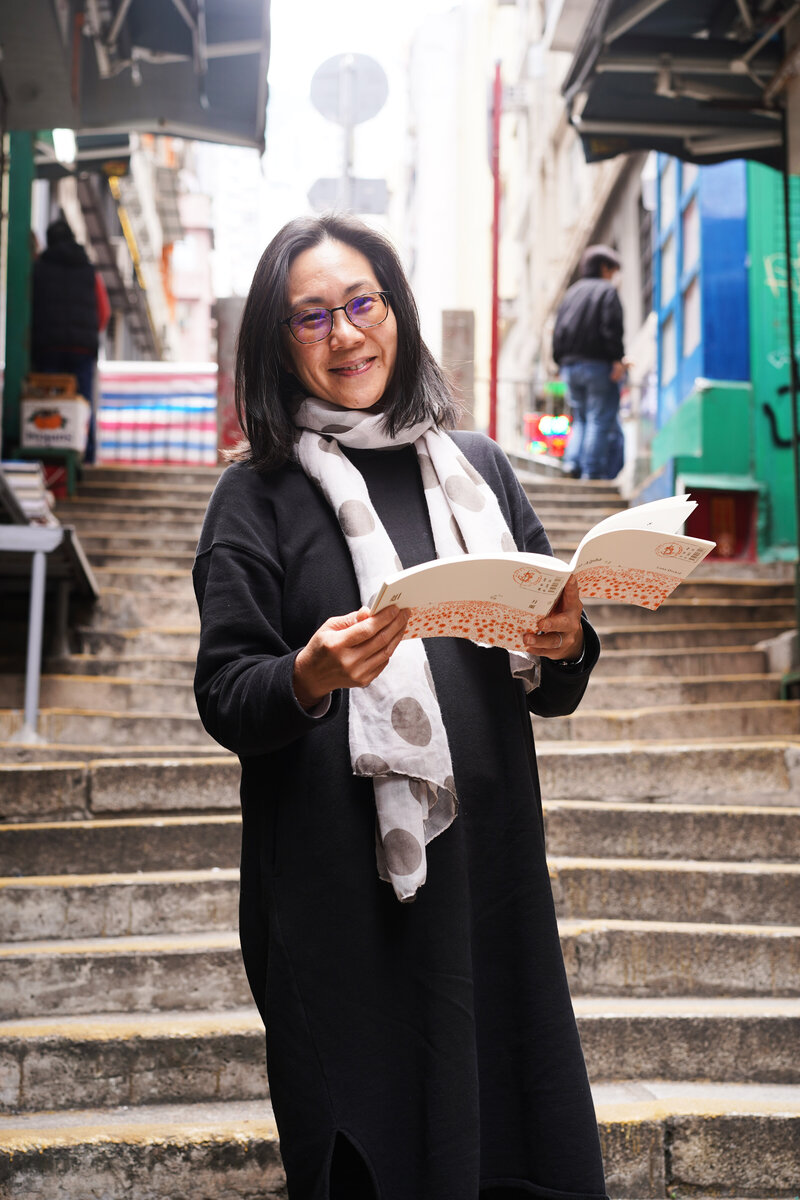 Maureen Tai with book