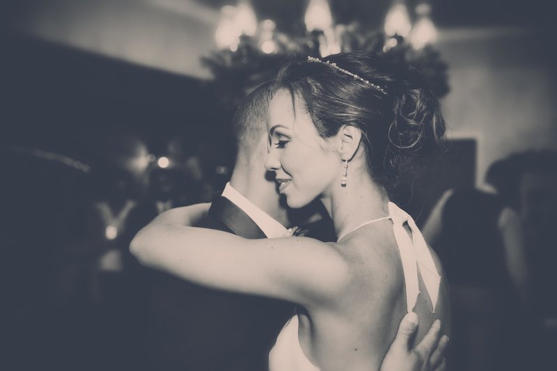 Bride and Groom embrace - B+W. Photo by Ross Photography, Trinidad, W.I..