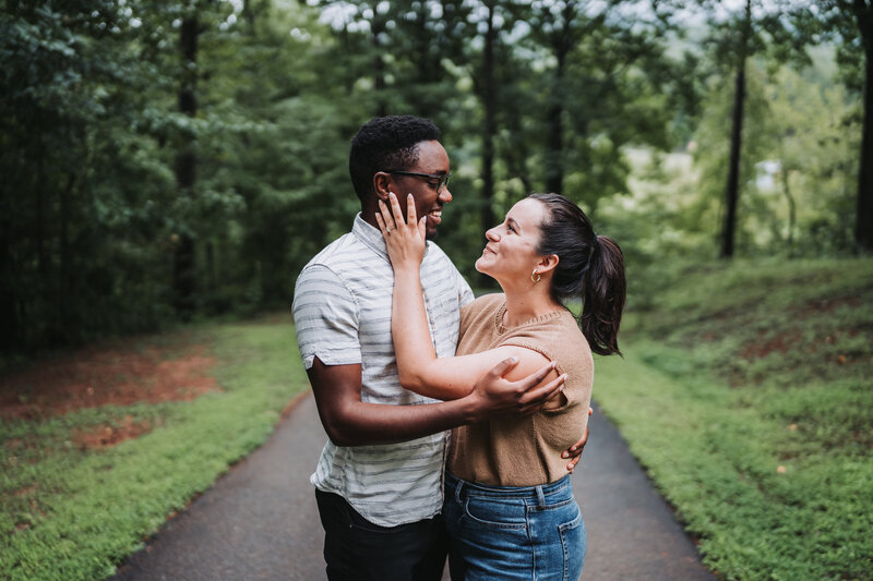 couple hugging on path