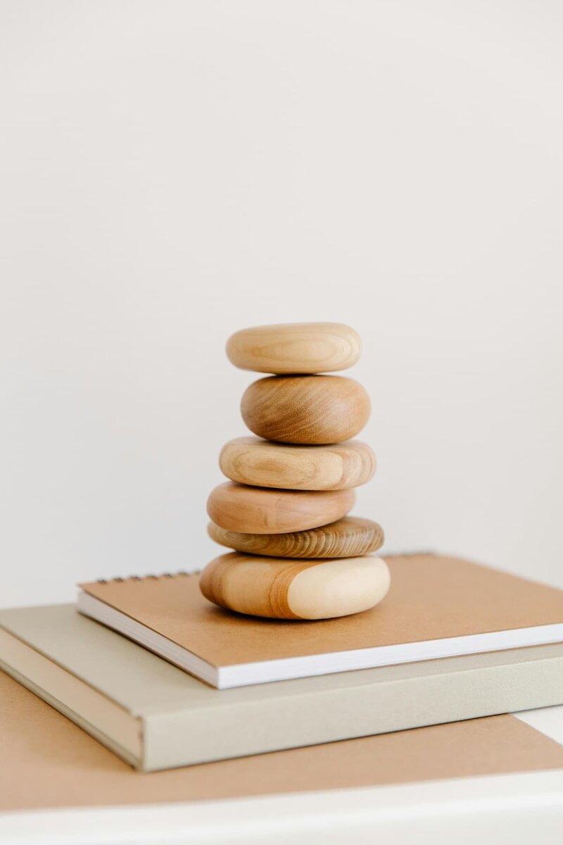wooden stones balanced in a pile