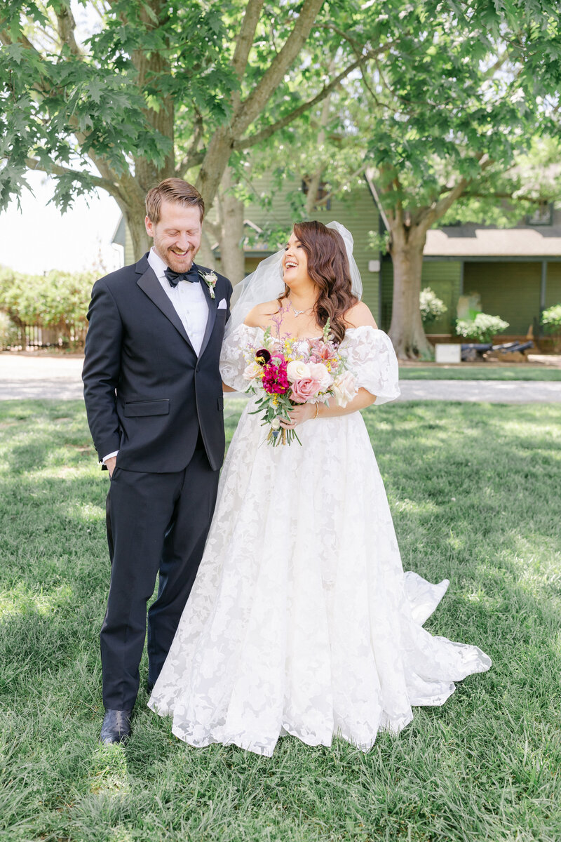 Bride and groom kiss on cheek