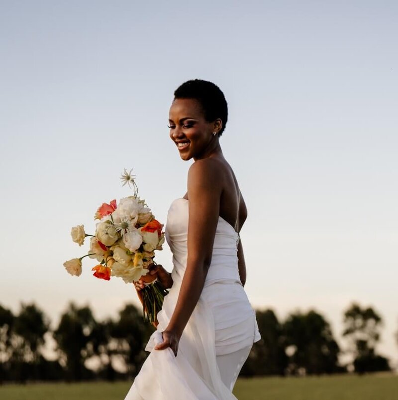 Bride and groom married in field