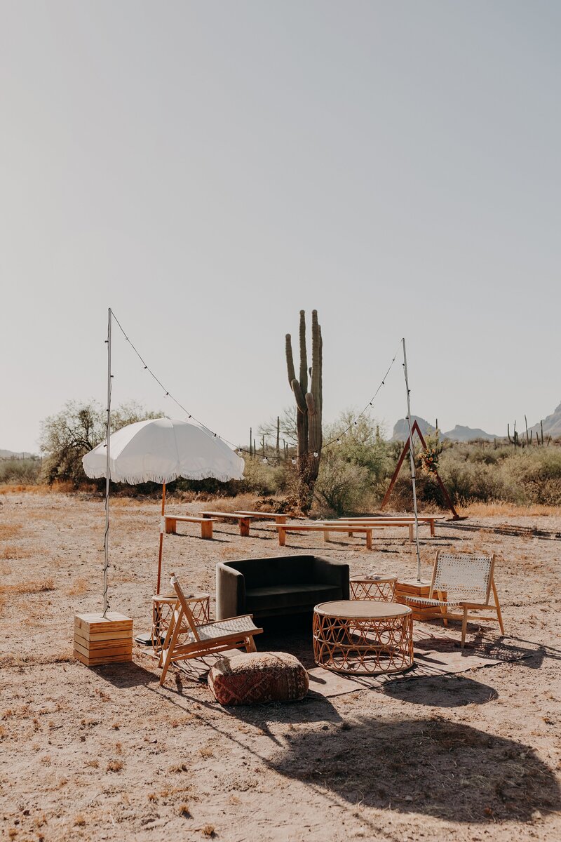 Outdoor lounge furniture at wedding in the desert