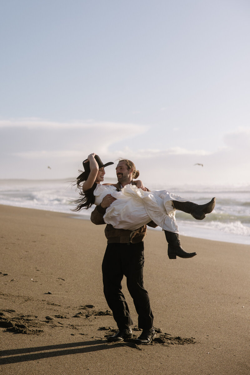 western beach elopement on beach