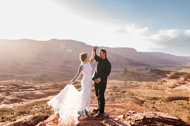a couple elopement pictures in the sunrise Oregon Coast Elopement and Wedding Photographer