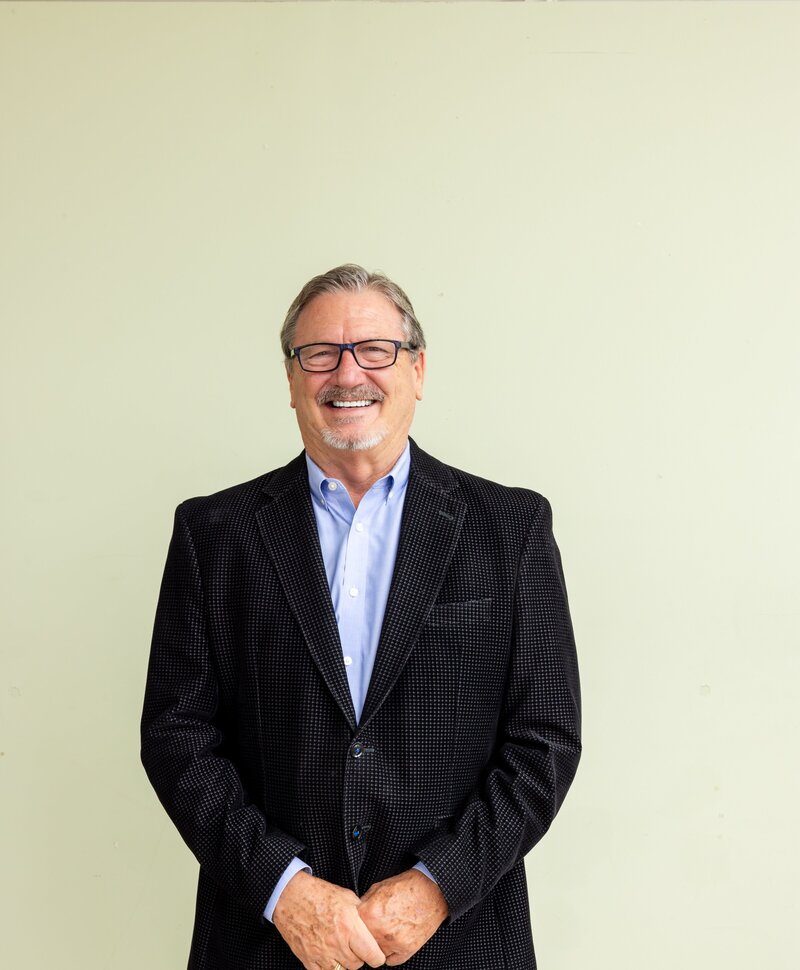 Portrait of WLS Interests founder Bill Sisson, recognized for more than 40 years of leadership in property management, real estate investment, and development oversight.