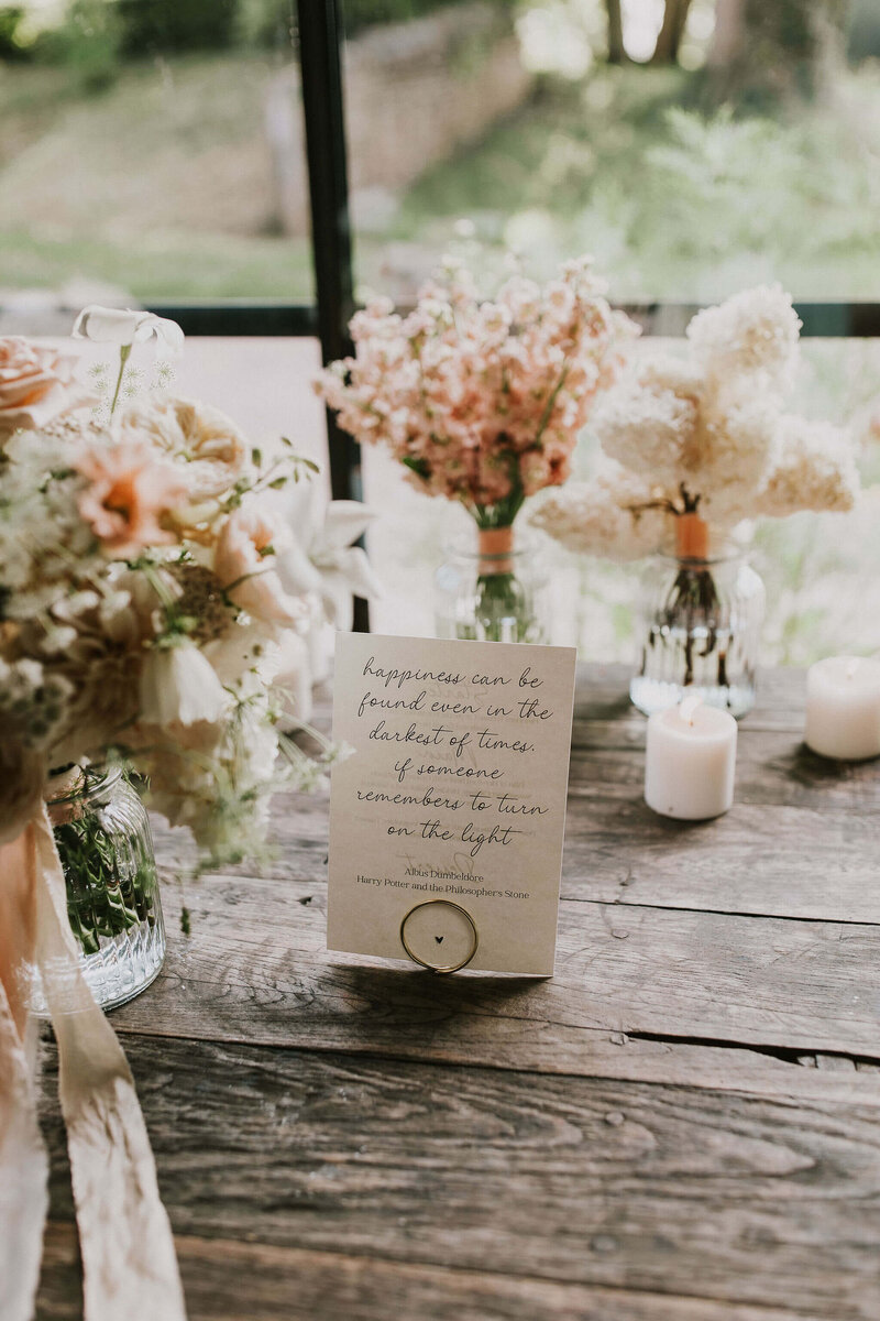 Bridesmaids' flowers in vases at Dewsall Court