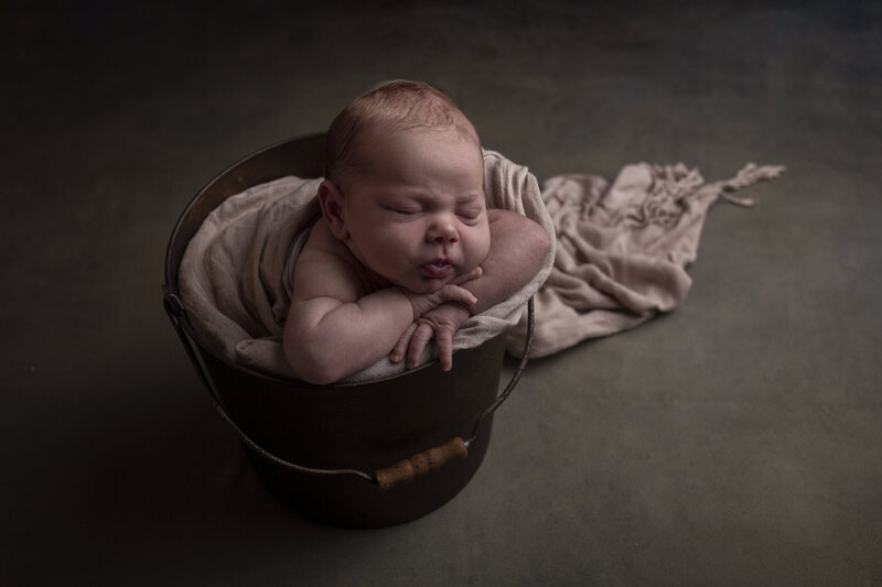chin-under-hands-wylie-newborn-photographer
