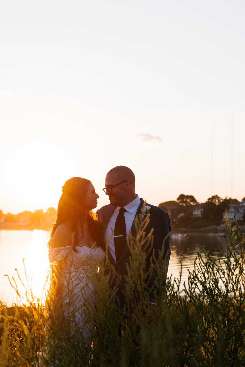 Wedding couple sunset views at Nantasket Beach 