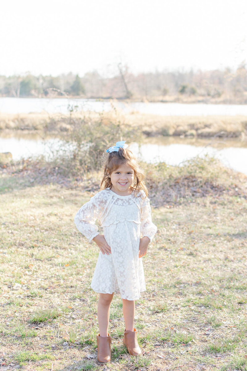 Toddler girl smiling during Centreville, Virginia pictures
