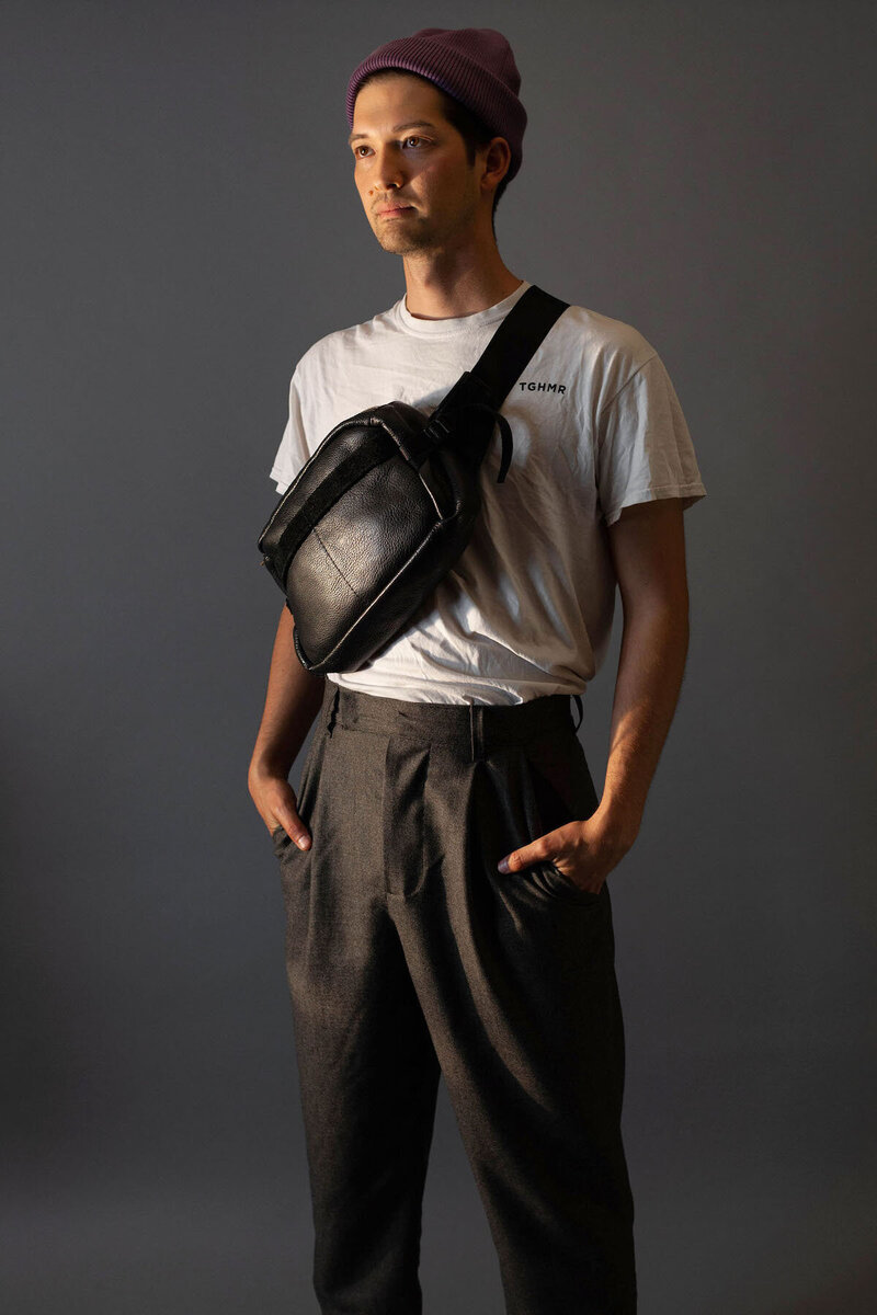 JWR model wearing leather bag and wool pants
