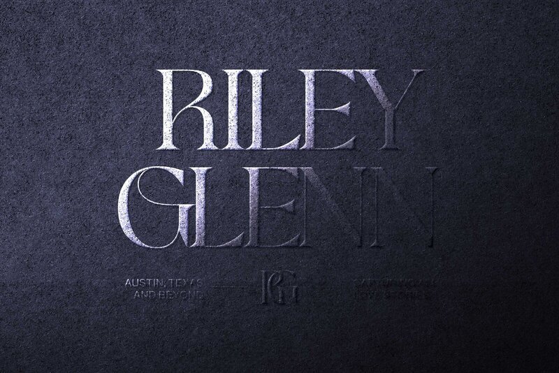 Embossed paper that has Riley Glenn's logo on it.