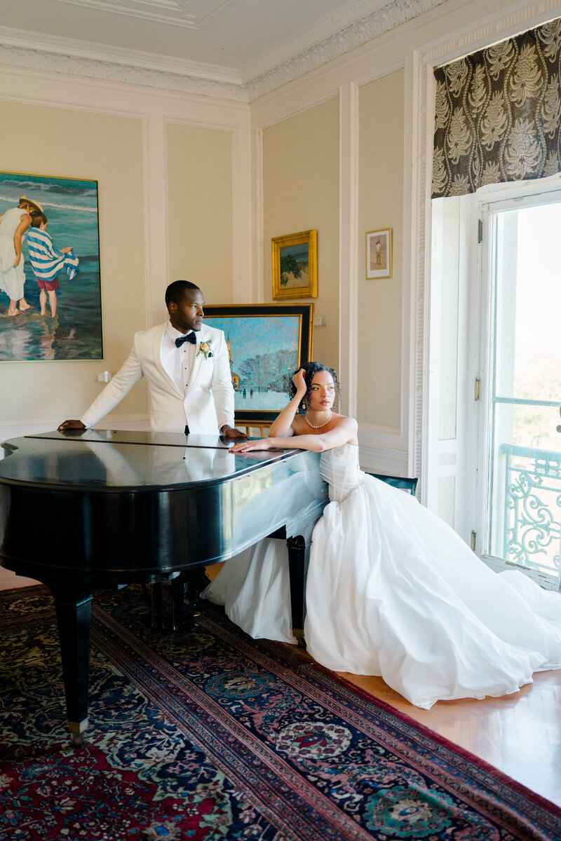 Newport Wedding Photographer | Rhode Island Caprio Captured Photography | Couple Sitting On A Couch While Holding Margarita Glasses