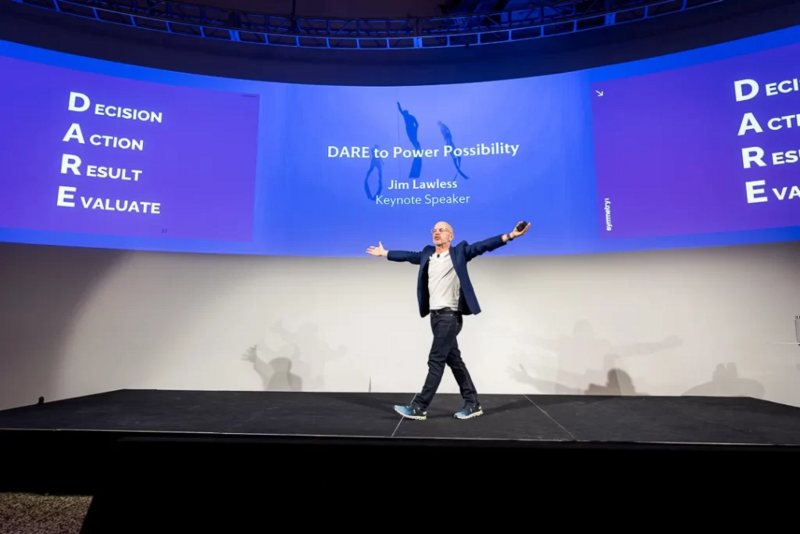 Corporate event photography in NJ capturing presenter on stage with professional lighting
