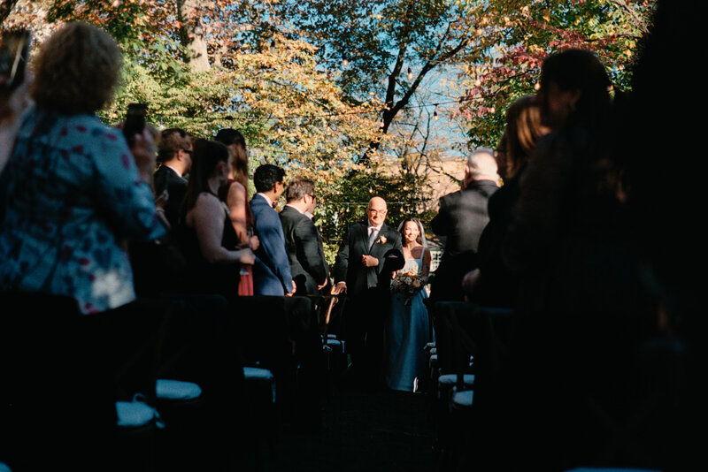 Wedding guests watch ceremony at Glen Foerd Estate in Philadelphia, PA