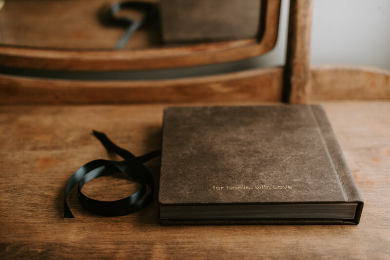 Newborn Photographer, Flat lay display of photo album