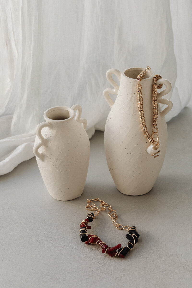 kaboompics_elegant-jewelry-and-decor-necklaces-bracelets-and-vases-free-stock-photo-collection-35777