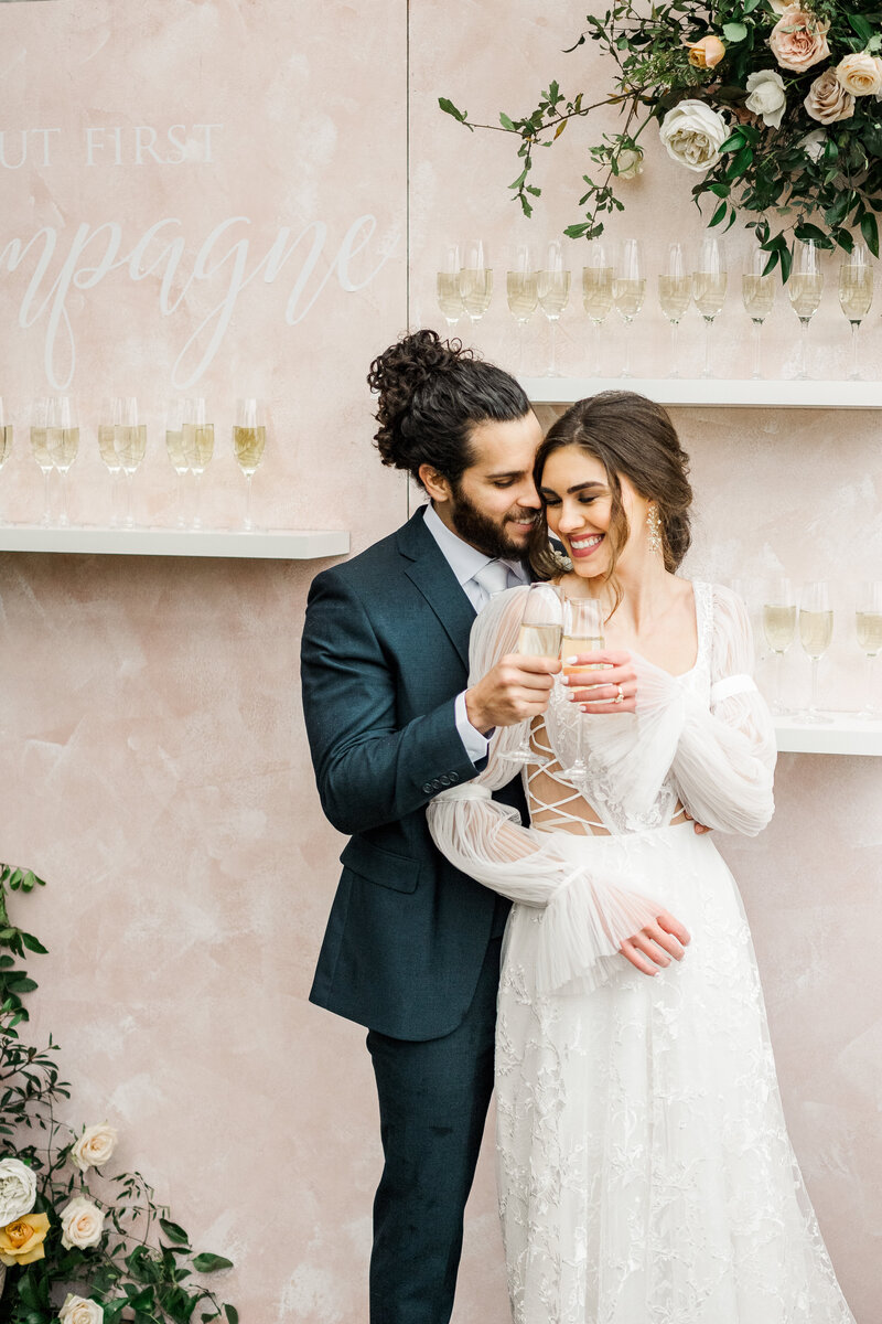 Bella Collina in Florida Destination Wedding Champagne Wall with Newlyweds