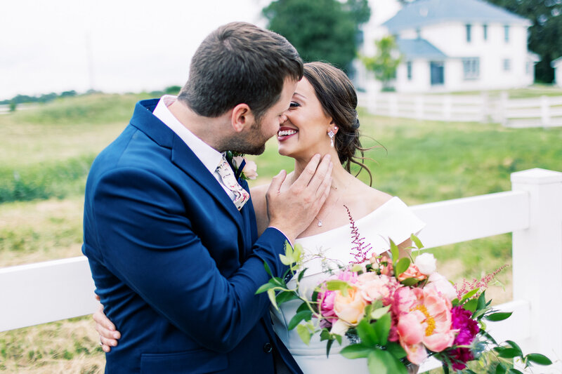 Bride and groom having intimate moment at Abella Weddings & Events