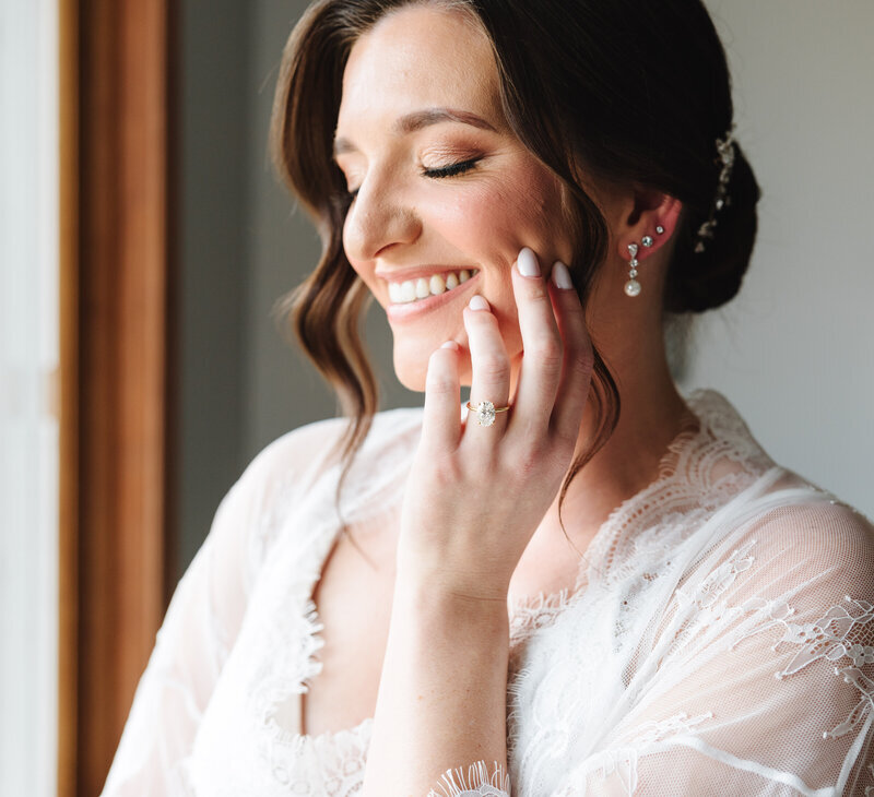 Bride smiling after her bridal hair and makeup packages.