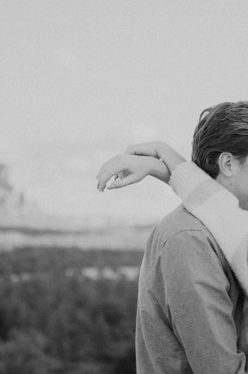  couple embracing by kentucky wedding photographer