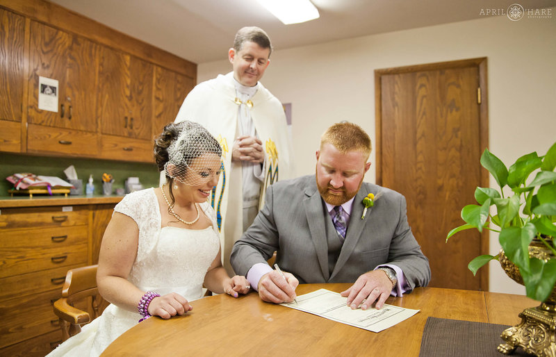 Marriage license signing at Saint Mary Catholic Church in Greeley