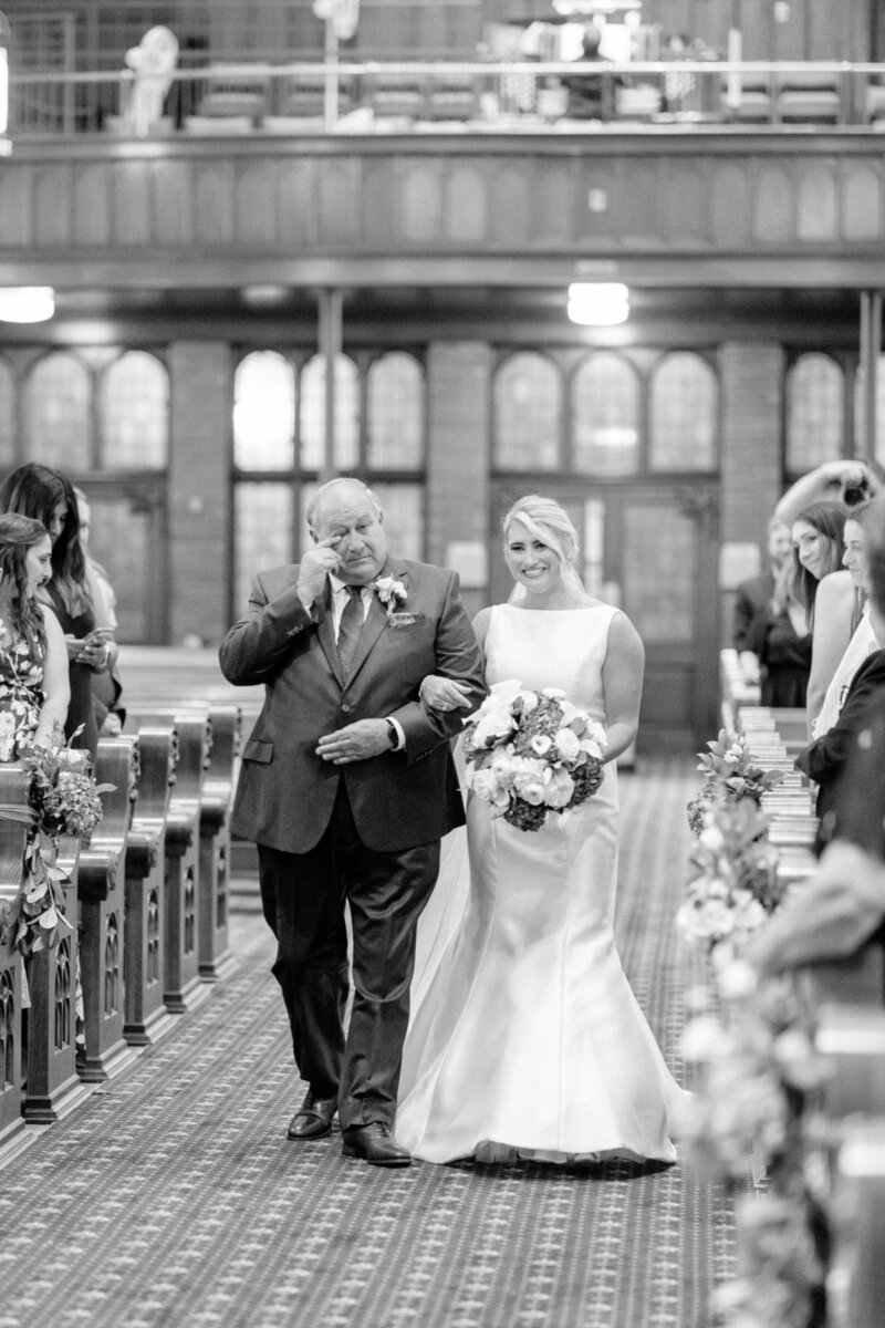 Bride and groom walk up memorial steps at their DC wedding