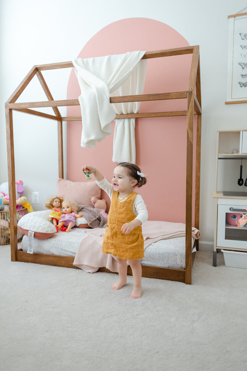 Toddler in her room playing