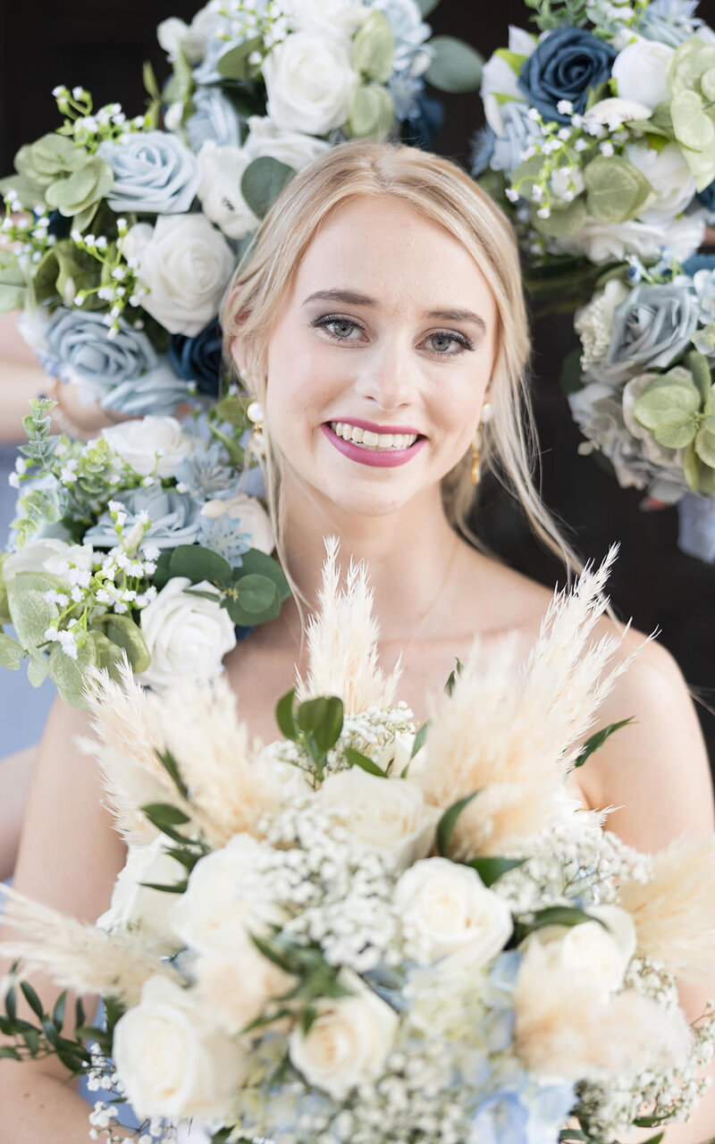 Jacksonville Bride surrounded by flowers in a portrait