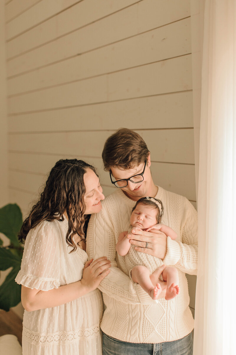 newborn photo with parents