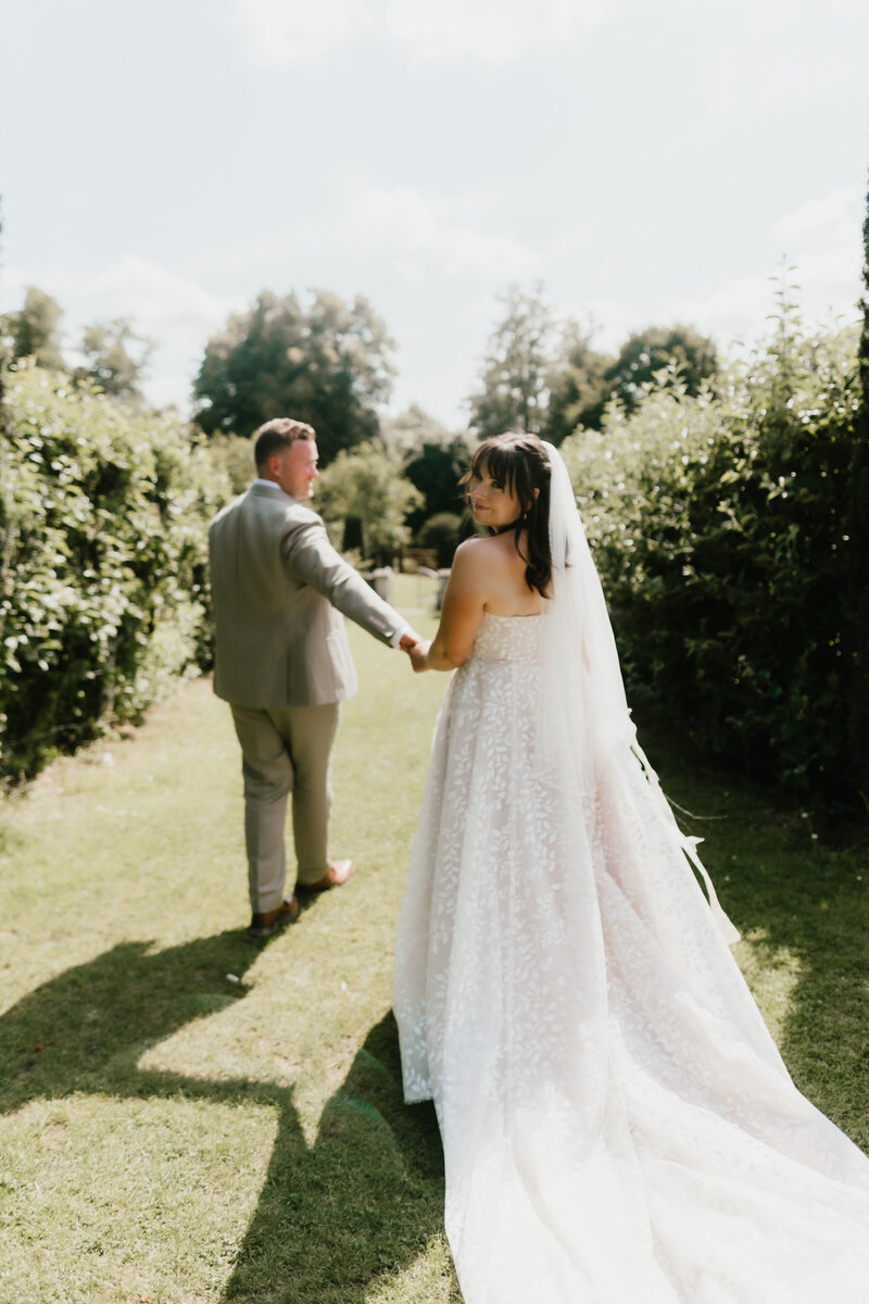 Bride and groom during their portraits in the garden of Hatch House