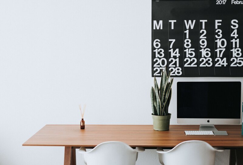 wall calendar on simplistic working desk
