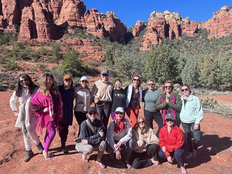 Stephanie with a group of women on a yoga retreat in Sedona 