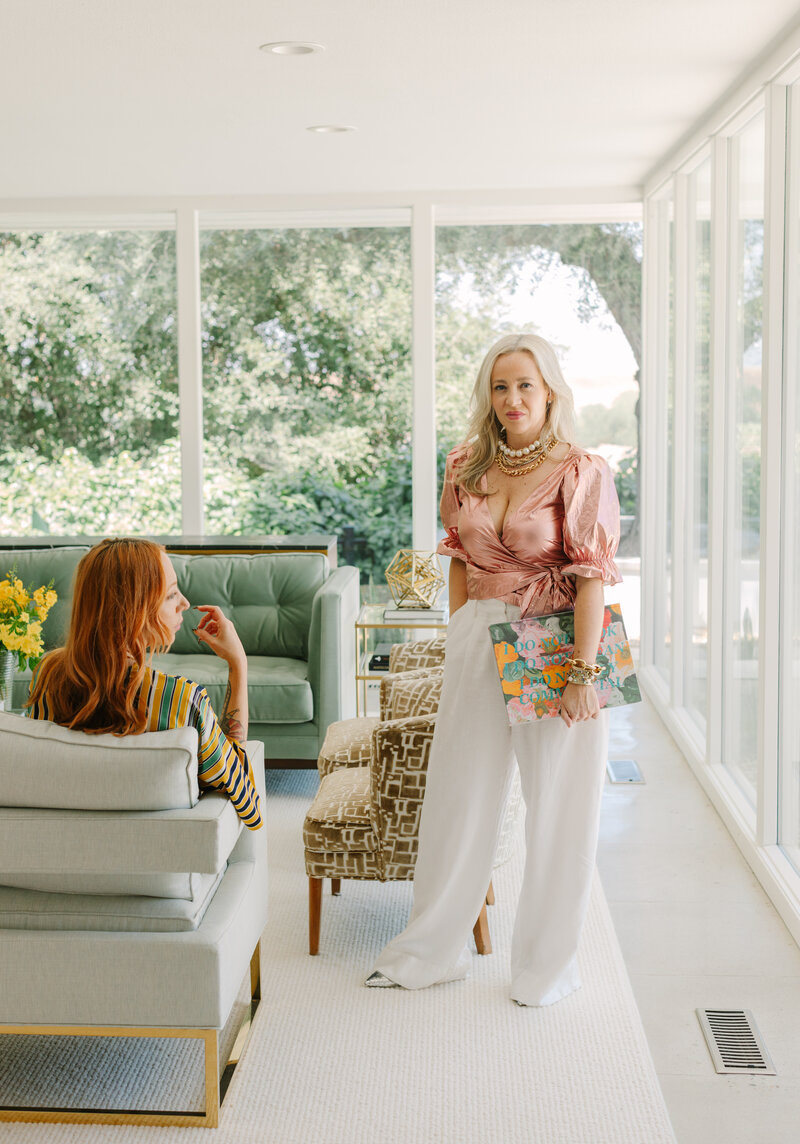 Bold brand session with two women in fashion-forward outfits inside a chic interior. Greenville SC. Dani Lacey Photographs.