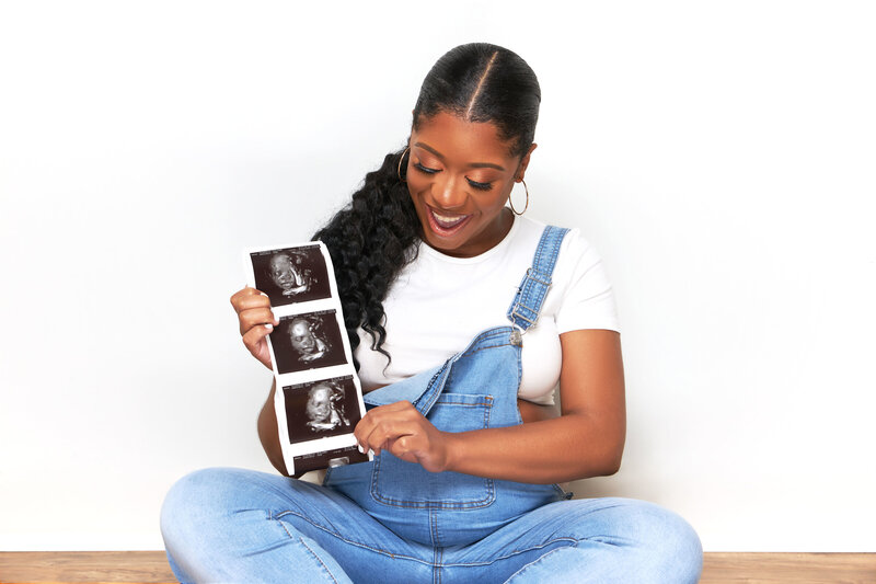 Jasmin Fields is celebrating her pregnancy announcement with a photo shoot with Belle Rouge Photography.