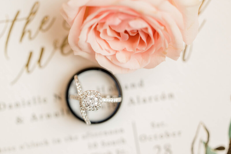 Stacked wedding ring, engagement ring detail shot at wedding.  Milwaukee wedding photographer.