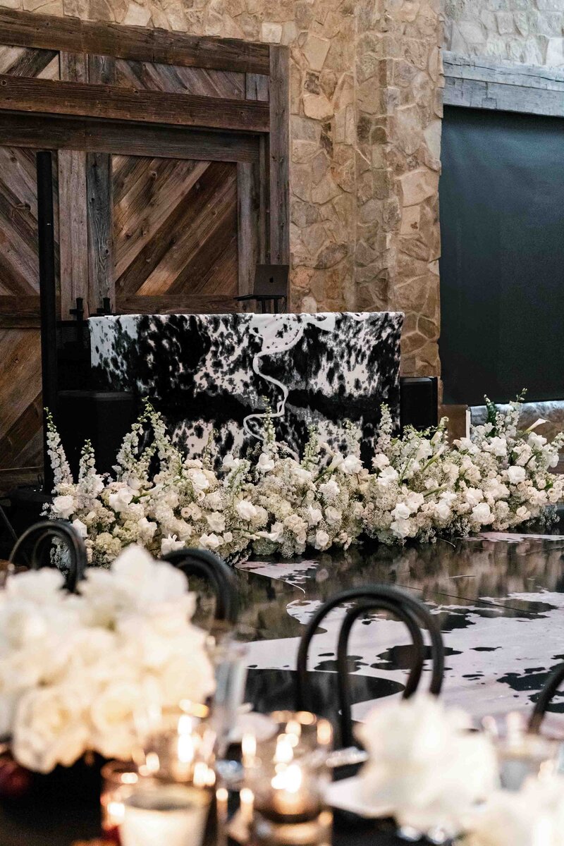 A wedding dance floor in a cowhide design