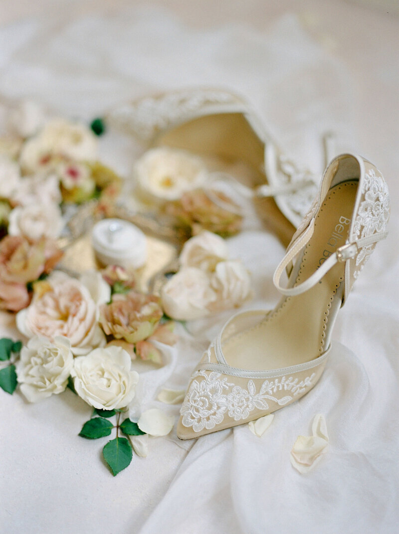 Gorgeous cream shoes for wedding day with flowers