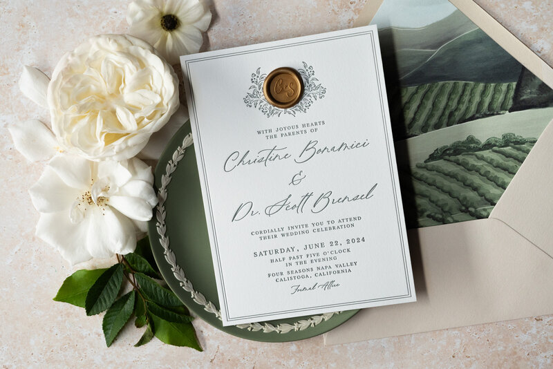 Custom designed wedding stationery with white paper and modern serif text