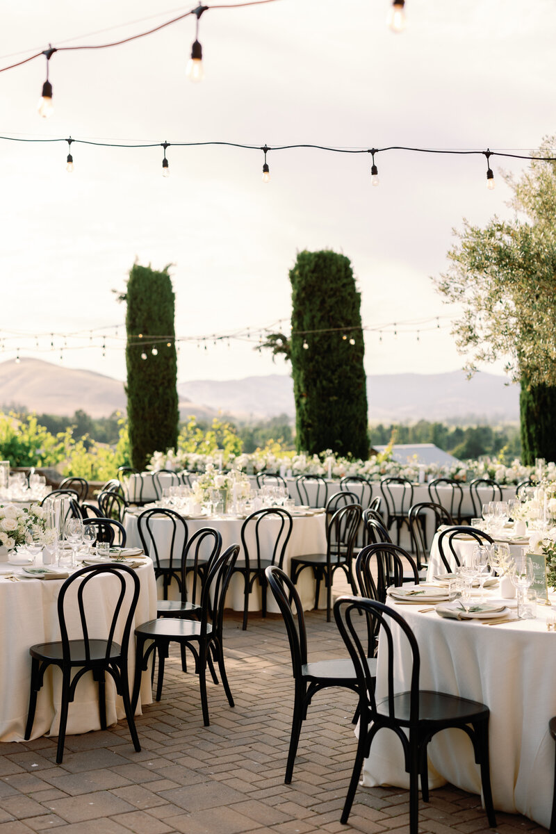 Romantic outdoor wedding setup at Viansa Winery in Sonoma, California. Dreamy vineyard wedding with stunning views.