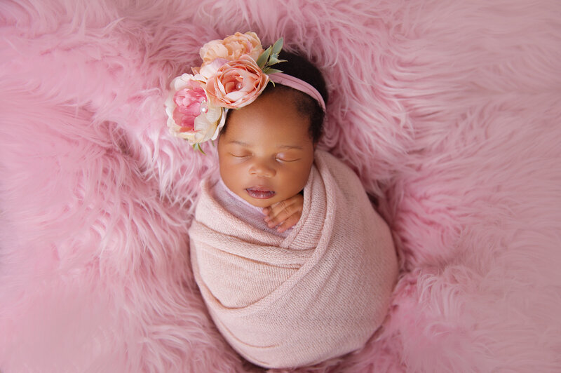 Newborn baby photoshoot in Pretoria Waverley baby wrapped in pink