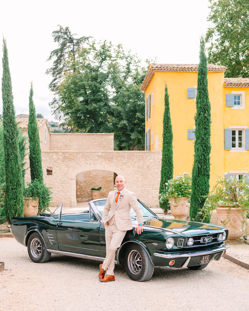 Groom Portrait with a Ford Mustang Classic Car at a Vintage Wedding in Provence