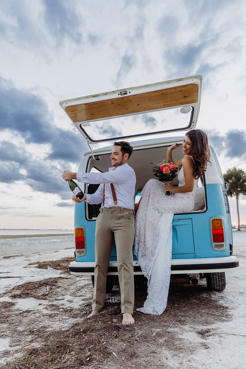 portraits of a couple in a vintage car after their tampa elopement