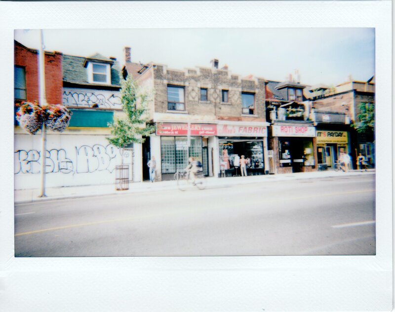 Polaroid of brooklyn street with graffiti