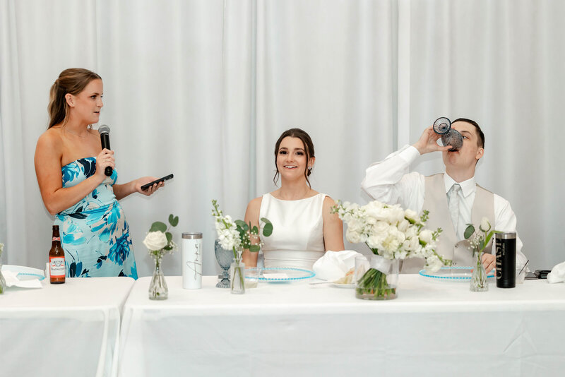 Heartfelt maid of honor speech captured by Style & Grace Photography at the St. Charles Foundry in St. Charles, MO, showcasing emotional moments and reactions during the wedding reception